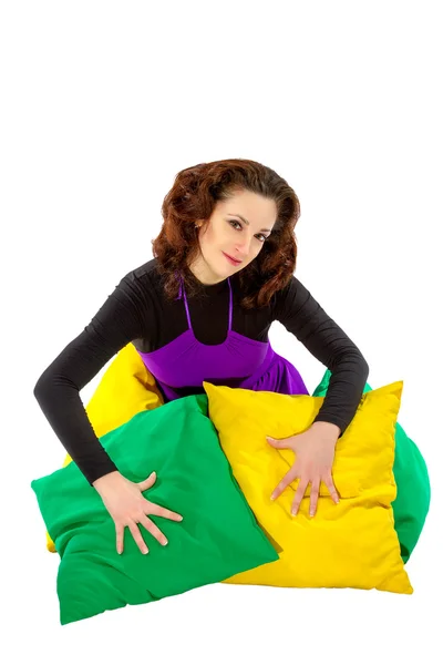 Woman with cushions on a white background — Stock Photo, Image