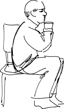 Büyükbabam bir sandalyede oturan bir bardak içme 