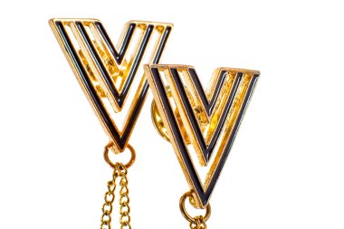 golden ornament on a chain for a collar shirt 