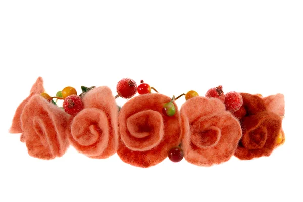 Berries and beautiful roses woven into a wreath — Stock Photo, Image