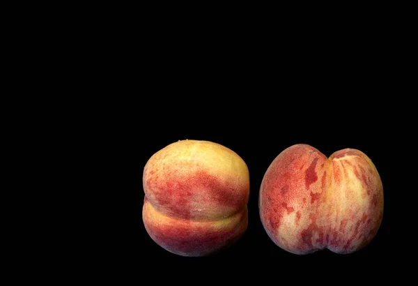 Image Two Ripe Peaches Black Background — Stok fotoğraf