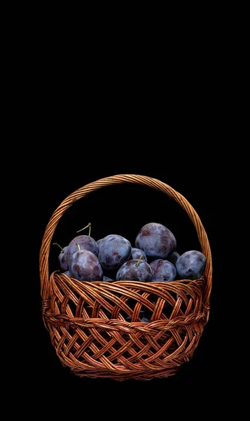 Image Basket Full Ripe Plums Black Background — Stock Photo, Image