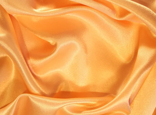 光滑优雅黄金丝绸作为背景 — 图库照片