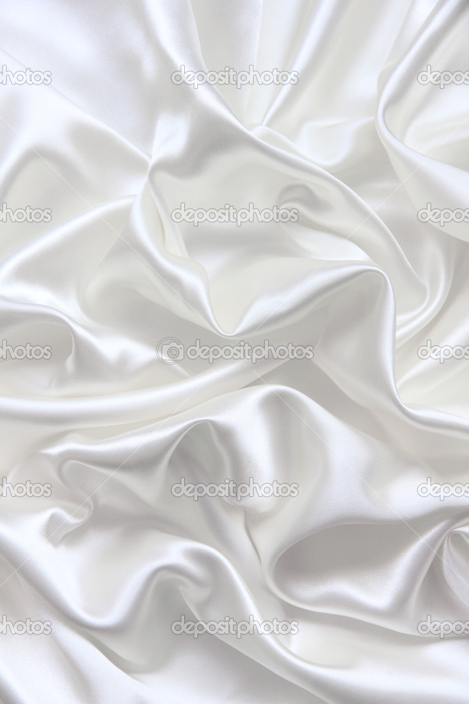 Smooth elegant  white  silk as wedding background   Stock 