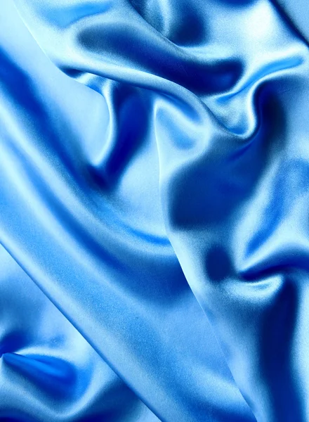 Hladké elegantní modré hedvábí jako pozadí — Stockfoto