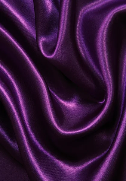 Гладкий элегантный сиреневый шелк в качестве фона — стоковое фото