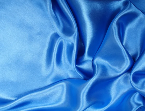 Gładki elegancki niebieski jedwab może służyć jako tło — Zdjęcie stockowe