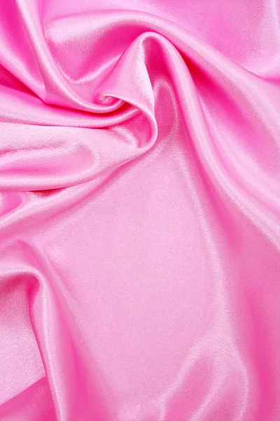 Soepele elegante roze zijde als achtergrond — Stockfoto