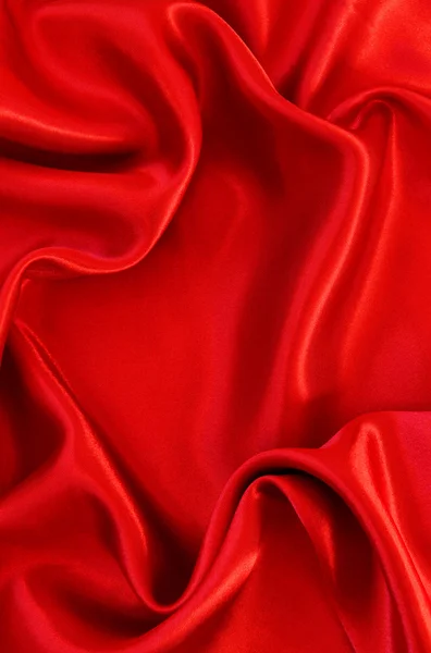 Smooth red silk as background Stock Photo