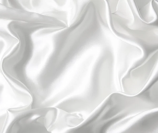 Smooth elegant white silk as wedding background Stock Picture