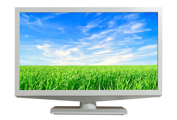 Monitor with sky and grass on screen isolated. — Stock Photo, Image