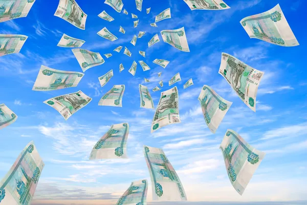 Russian money - rubles in the sky flying. — Stock Photo, Image