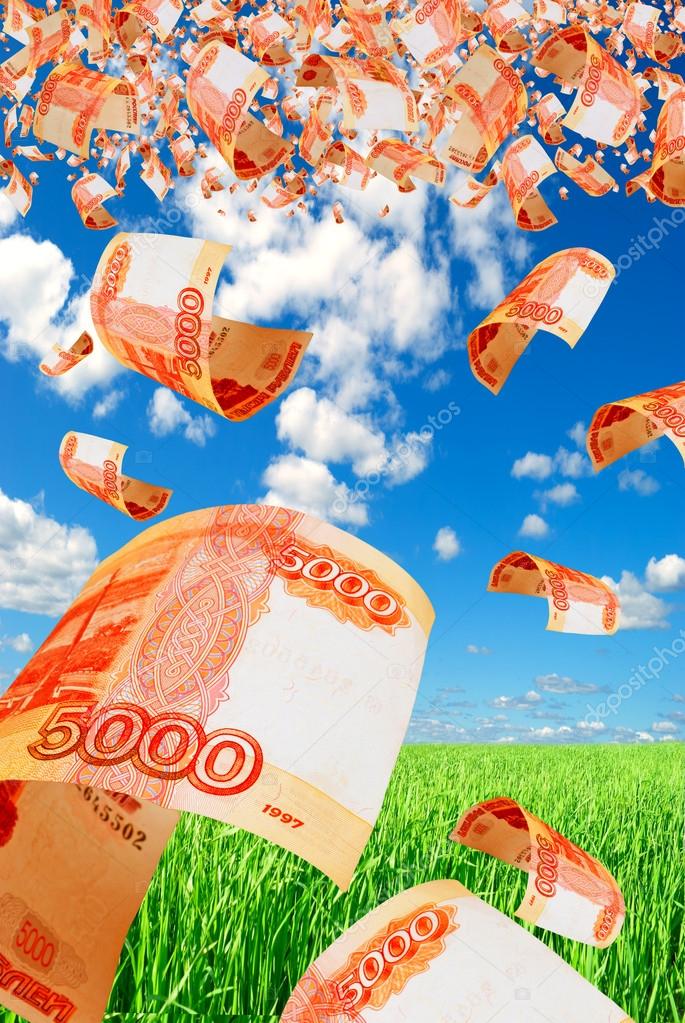 Russian money - rubles in the sky flying.