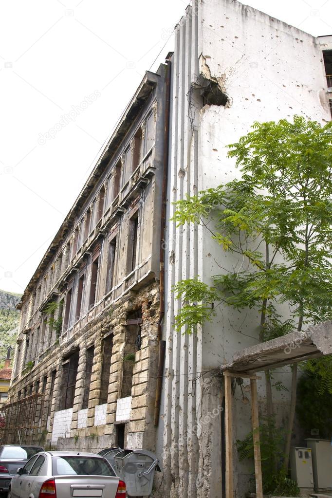 Bullets holes on building after war in Mostar