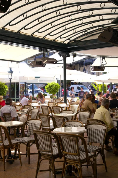 Summer patio of Cafe de Pari with wicker furniture — Stock Photo, Image
