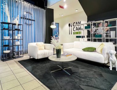 LATVIA, RIGA, JULY, 2022: Modern interior in black and white colors in the Stockmann shopping center, Riga. Latvia. Living room interior design.