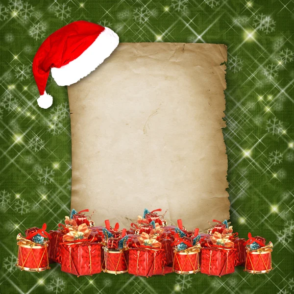 Noel tebrik kartı ile yeşil soyut bac üzerinde hediye — Stok fotoğraf