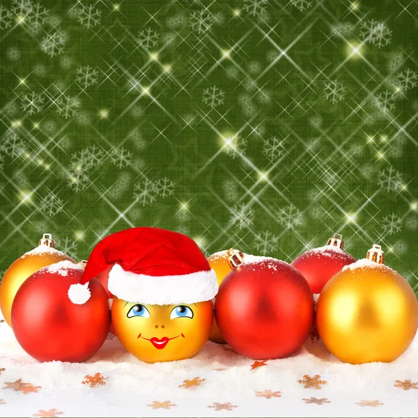 Різдвяний бал в капелюх Санта Клауса на абстрактні фонової м — стокове фото