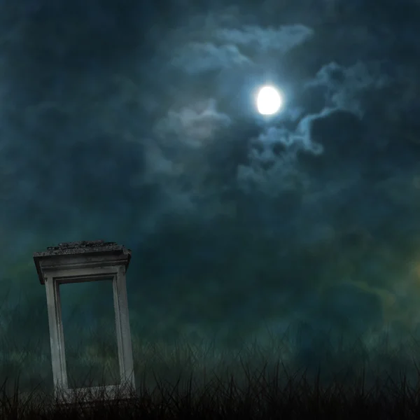 Spooky Halloween graveyard with dark clouds and ominous moon — Stock Photo, Image
