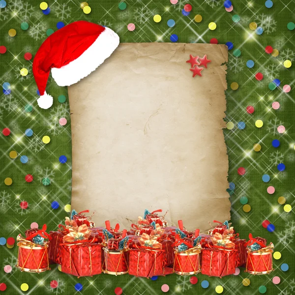 Weihnachtskugel mit Grußkarte auf weißem Hintergrund — Stockfoto