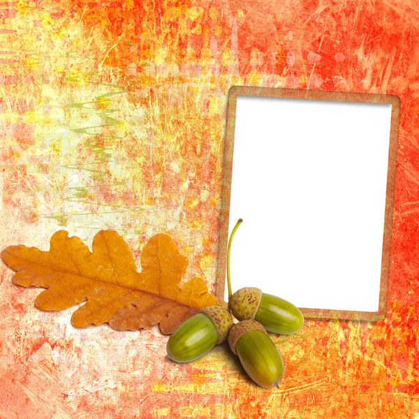 Old grunge frame with autumn oak leaves and acorns on the abstra — Stock Photo, Image