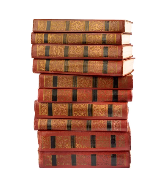 सोन्याच्या स्टॅम्पिंगसह जुन्या पुस्तकांचा एक स्टॅक — स्टॉक फोटो, इमेज