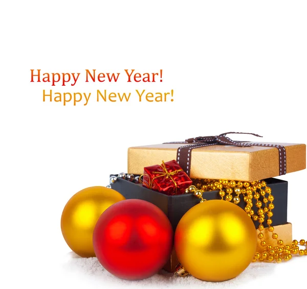 Golden gift box with Christmas balls and garlands of beautiful beads — Stock Photo, Image