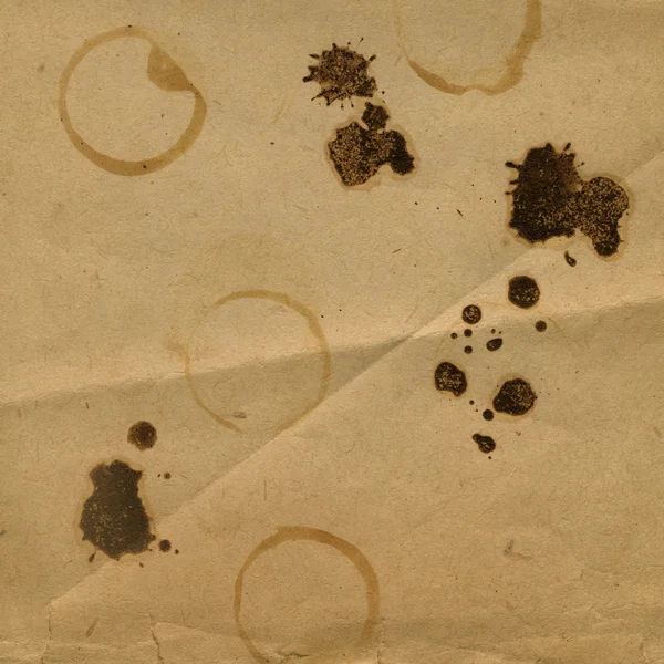 Stary zmięty papier z plam z kawy lub herbaty — Zdjęcie stockowe