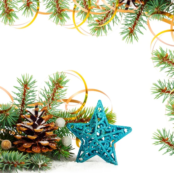 Christmas tree branch with gold serpentine and star — Stock Photo, Image