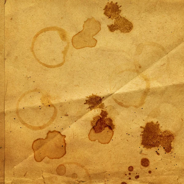 Altes zerknülltes Papier mit Flecken von Kaffee oder Tee — Stockfoto