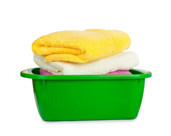 Towels in the green basin — Stock Photo, Image