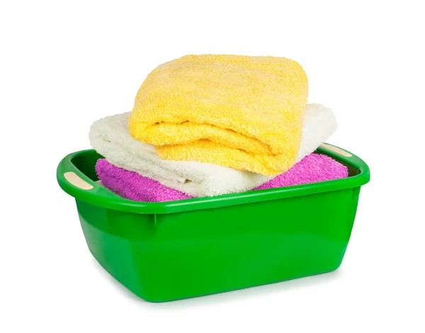 Towels in the green basin — Stock Photo, Image