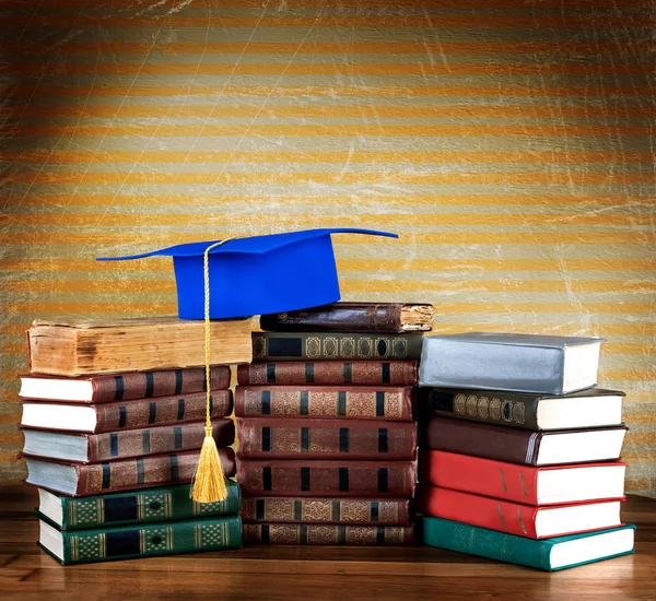 Top of stack of books on abstract back — Stock Photo, Image