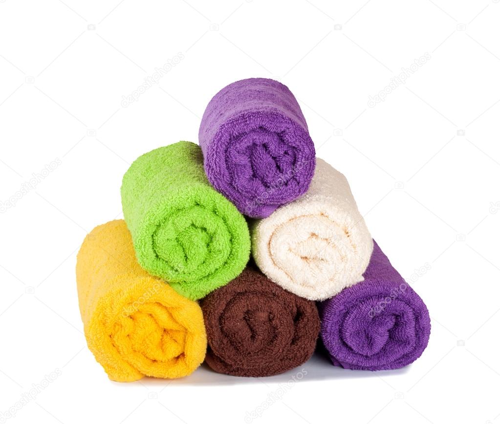 Stack of clean fresh towels isolated on white background