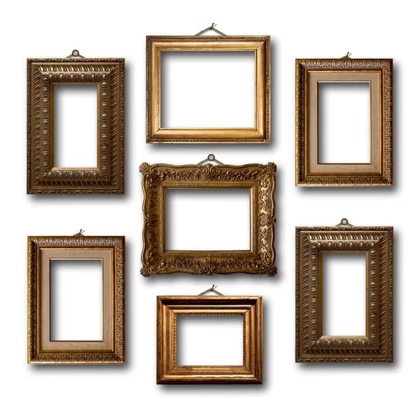 Houten frames voor foto's op witte geïsoleerde achtergrond verguld — Stockfoto