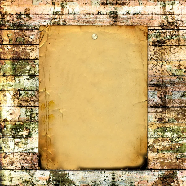 Old wooden plank with paper card — Stock Photo, Image