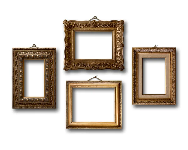 Houten frames voor foto's op witte geïsoleerde achtergrond verguld — Stockfoto