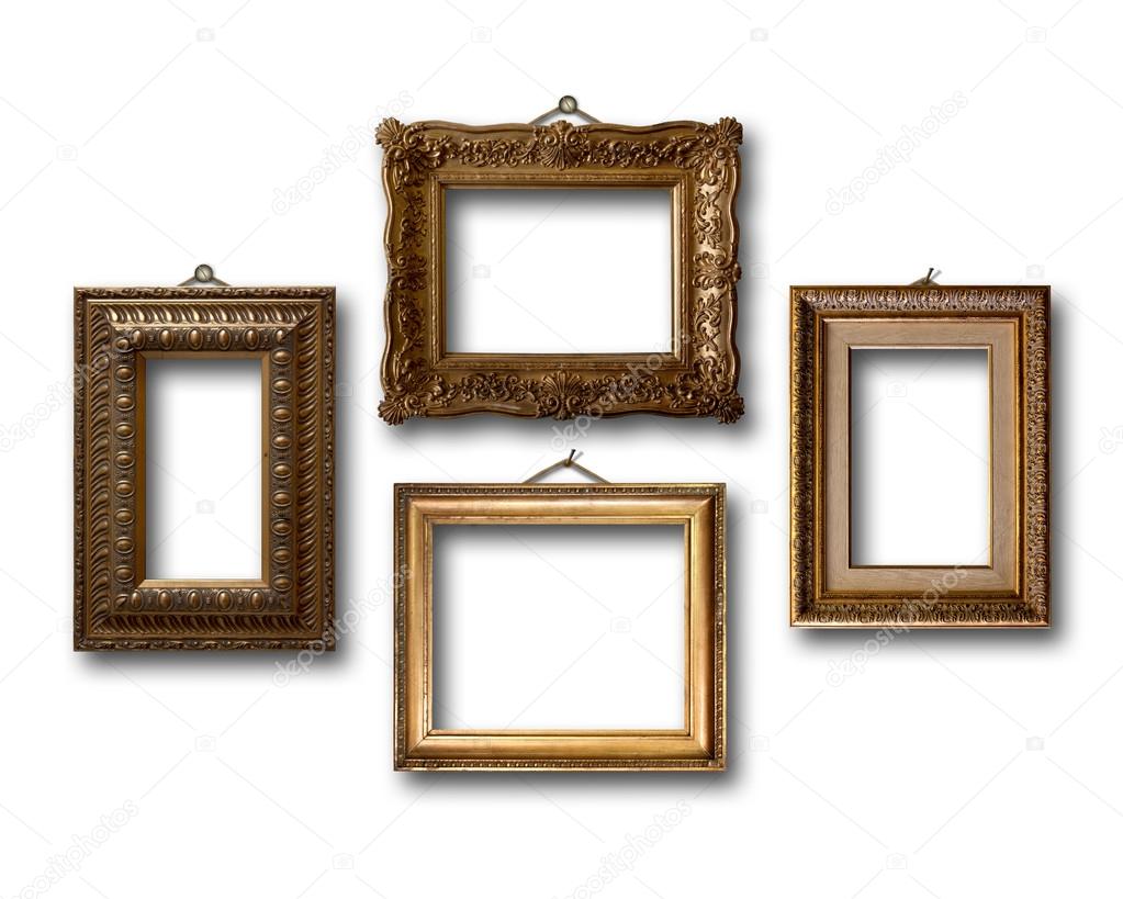 Gilded wooden frames for pictures on white isolated background 
