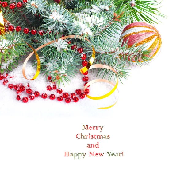 Christmas tree branch with gold serpentine and red sphere on whi — Stock Photo, Image