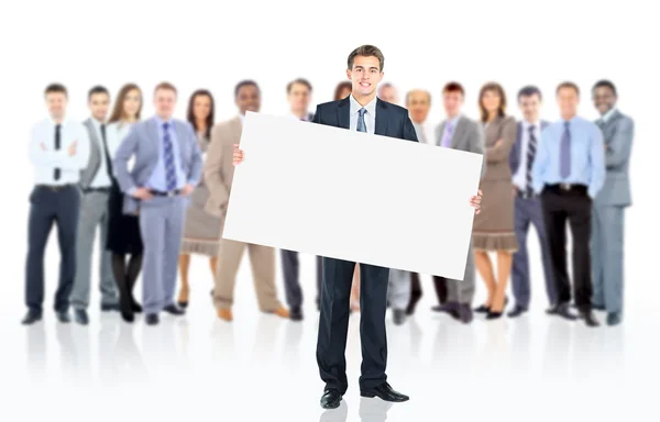 Business man with a banner and his business team — Stock Photo, Image