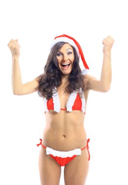 Beyaz bir arka plan üzerinde gülümseyen izole Noel Baba şapkası giyen sürpriz Noel kadın