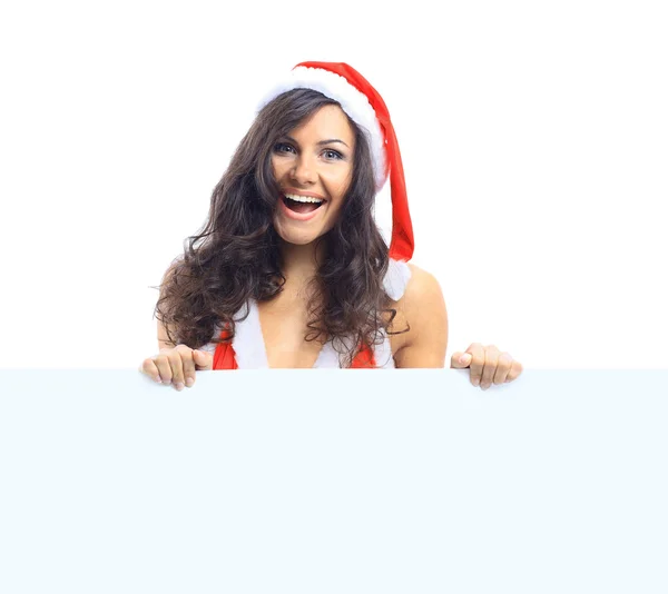 Gyönyörű karácsonyi nő Mikulás kalap kezében üres fórumon — Stock Fotó