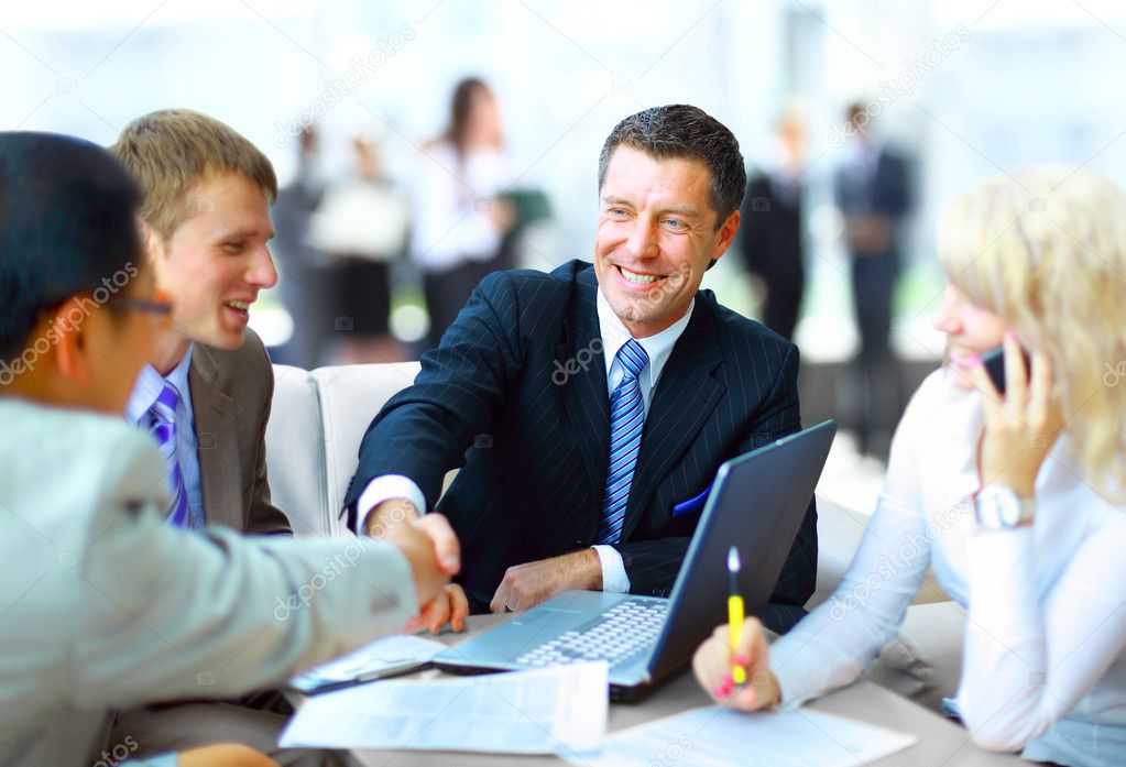 Business shaking hands, finishing up a meeting