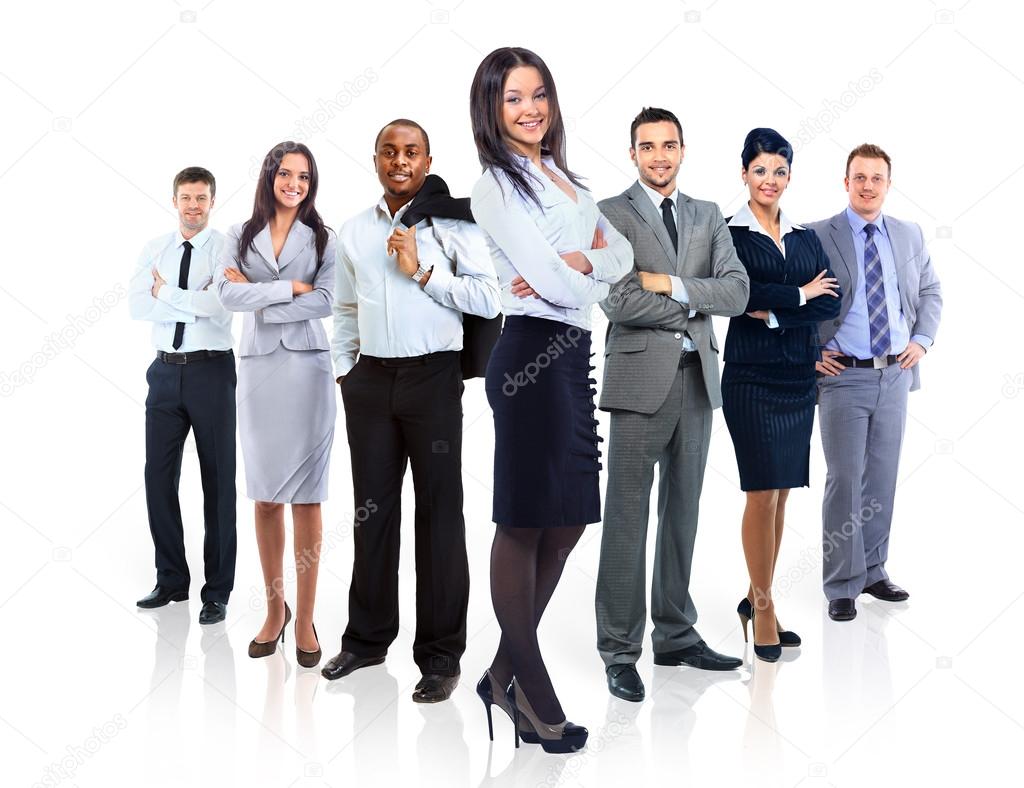 Group of business standing in huddle, smiling, low angle view