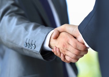 Handshake in office clipart