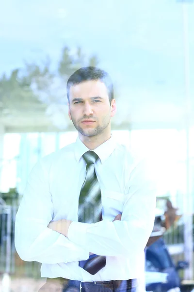 Business man looking through window — Stock Photo, Image