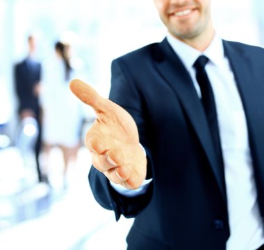 Businessman offering a handshake