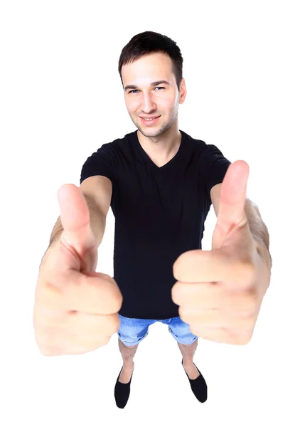 Smiling young man with thumbs up on an isolated white background — Stock Photo, Image