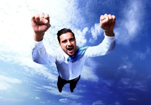 Šťastný podnikatel létání na obloze — Stock fotografie