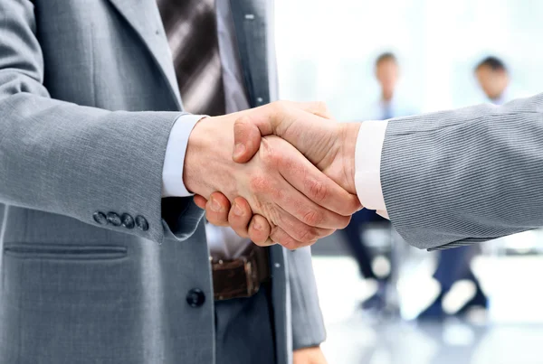 Close up of Businessmen shake hands — Stock fotografie